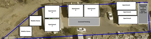 a view of a hallway with wooden floor and windows