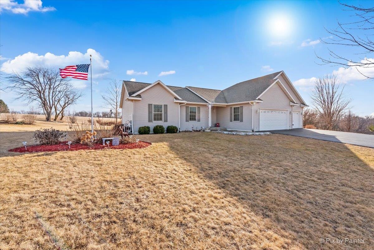 19-14 Timber Ridge Road Lanark, IL 61046 - Photo 1 of 55 a view of a house with a yard