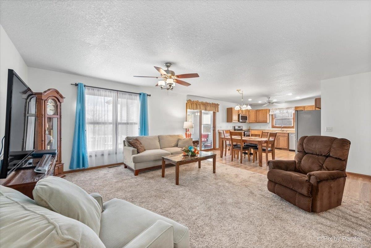 19-14 Timber Ridge Road Lanark, IL 61046 - Photo 12 of 55 a living room with furniture and a large window
