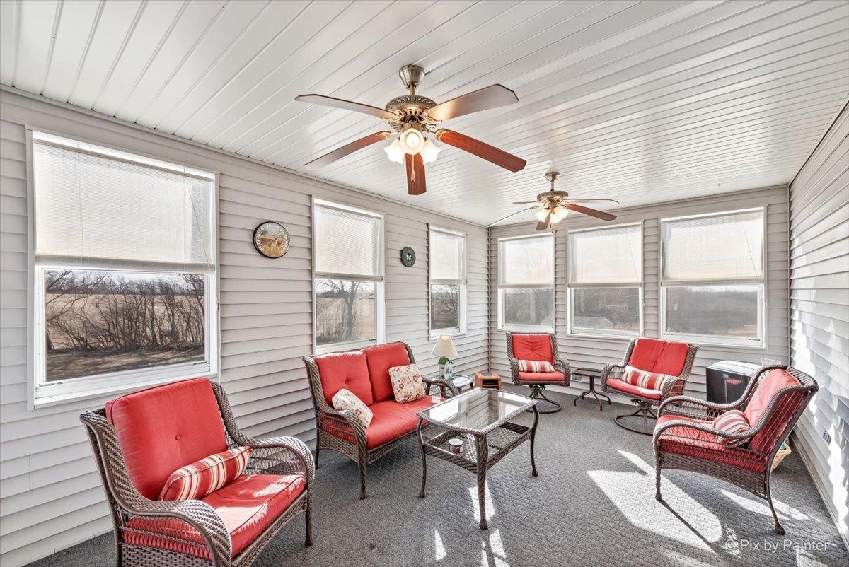 19-14 Timber Ridge Road Lanark, IL 61046 - Photo 22 of 55 a living room with furniture and a large window