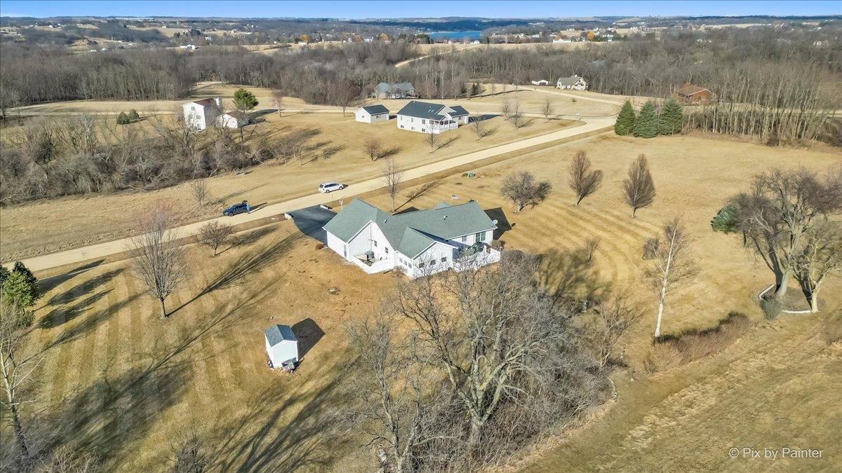 19-14 Timber Ridge Road Lanark, IL 61046 - Photo 41 of 55 a view of a lake with a mountain