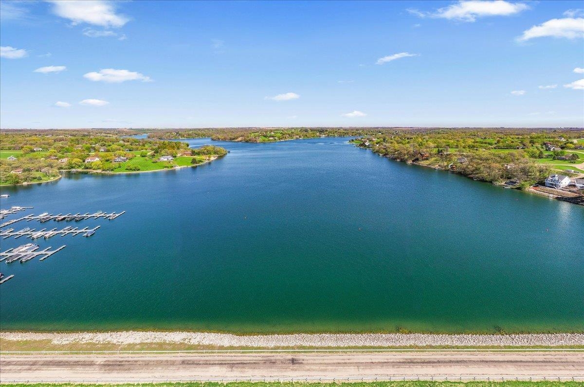 19-14 Timber Ridge Road Lanark, IL 61046 - Photo 47 of 55 a view of an ocean and a yard