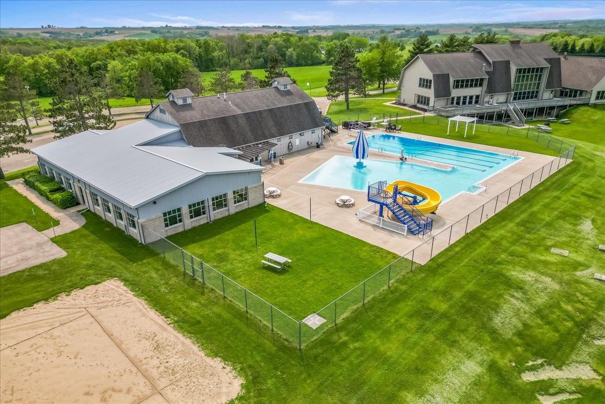 19-14 Timber Ridge Road Lanark, IL 61046 - Photo 49 of 55 an aerial view of a house with swimming pool big yard and large trees
