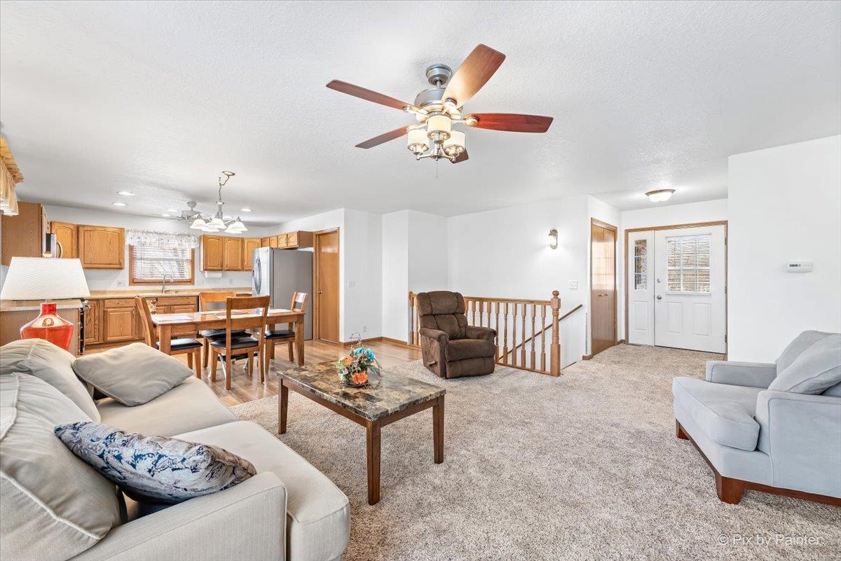 19-14 Timber Ridge Road Lanark, IL 61046 - Photo 5 of 55 a living room with furniture and a table