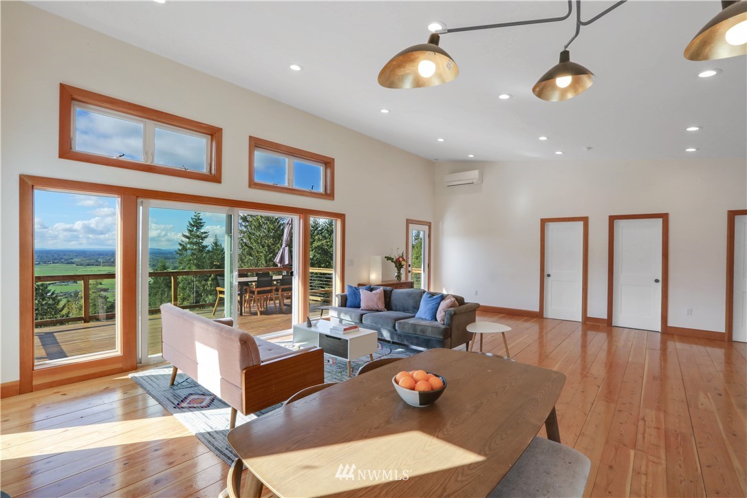 28740 Bacus Road Sedro-Woolley, WA 98284 - Photo 20 of 40 a living room with furniture and a large window