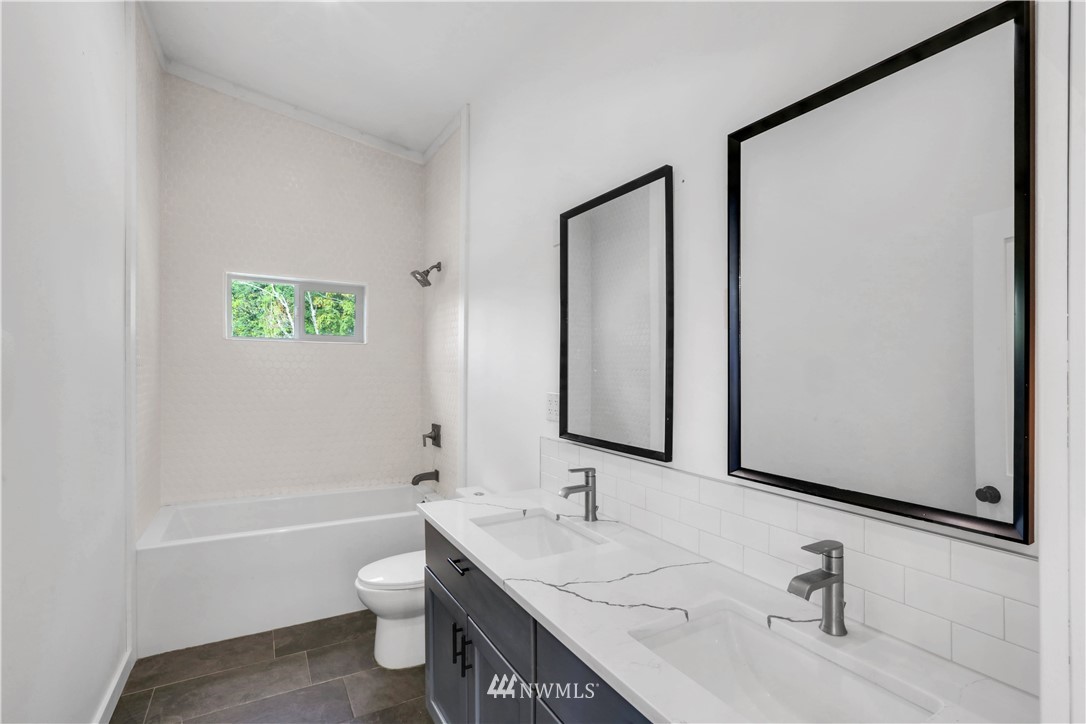 28740 Bacus Road Sedro-Woolley, WA 98284 - Photo 23 of 40 a bathroom with a sink a toilet and shower