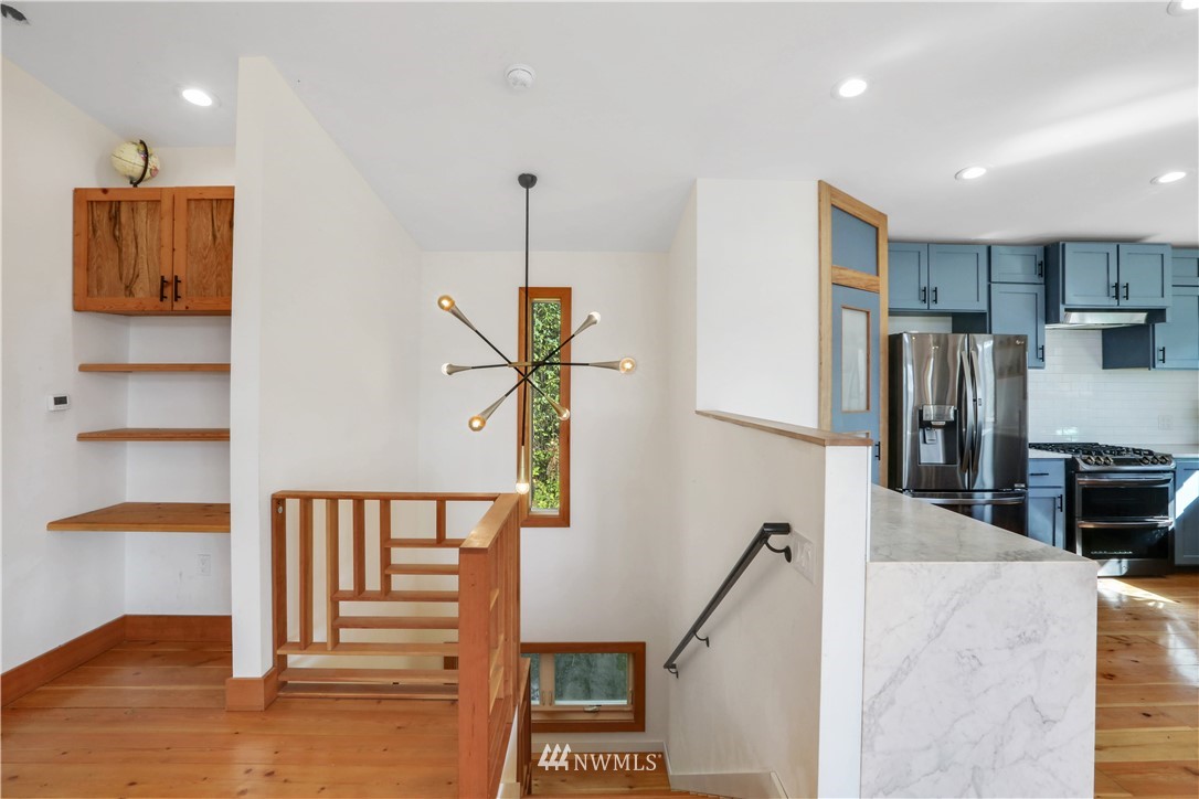28740 Bacus Road Sedro-Woolley, WA 98284 - Photo 24 of 40 a view of a kitchen with furniture and wooden floor