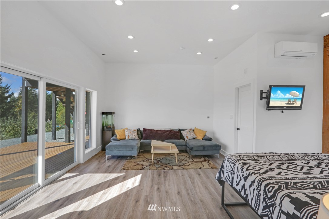 28740 Bacus Road Sedro-Woolley, WA 98284 - Photo 27 of 40 a bedroom with furniture and a window