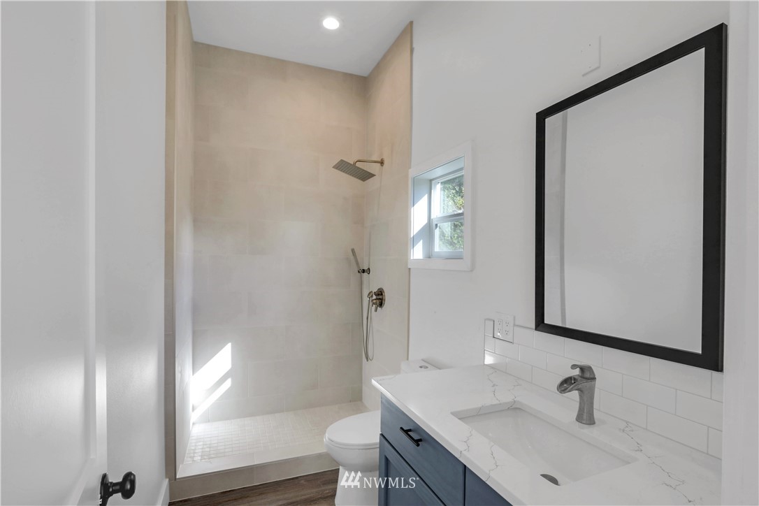 28740 Bacus Road Sedro-Woolley, WA 98284 - Photo 29 of 40 a bathroom with a sink a toilet and shower