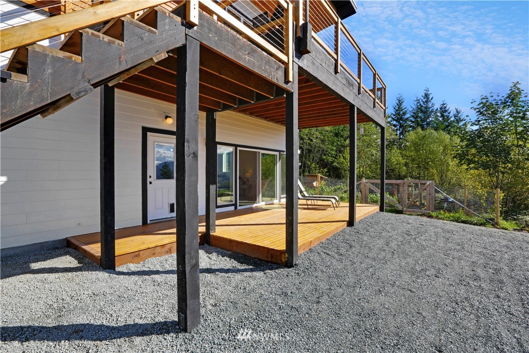 28740 Bacus Road Sedro-Woolley, WA 98284 - Photo 36 of 40 a view of a house with backyard and porch