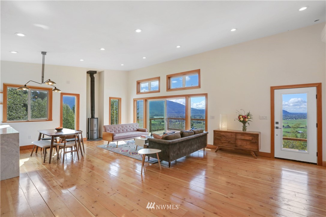 28740 Bacus Road Sedro-Woolley, WA 98284 - Photo 6 of 40 a living room with furniture and wooden floor