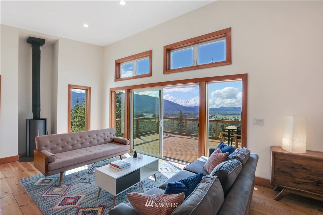 28740 Bacus Road Sedro-Woolley, WA 98284 - Photo 7 of 40 a living room with furniture and a large window