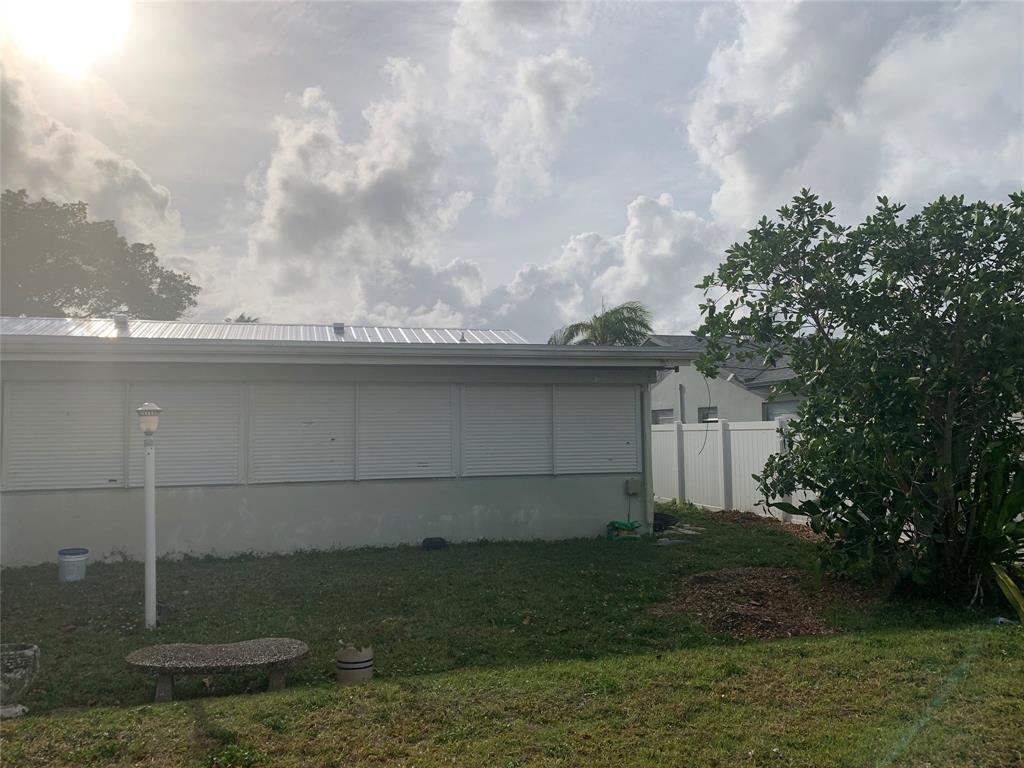 22720 Southwest 64th Way Boca Raton, FL 33428 - Photo 4 of 8 a view of outdoor space and yard