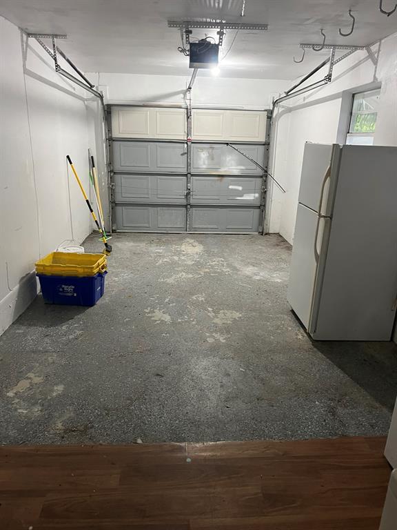 22720 Southwest 64th Way Boca Raton, FL 33428 - Photo 6 of 8 a view of a room with wooden floor and windows