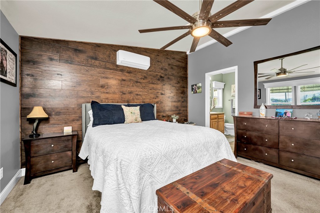 14986 Western Mine Road Middletown, CA 95461 - Photo 13 of 60 a bedroom with a bed and a dresser