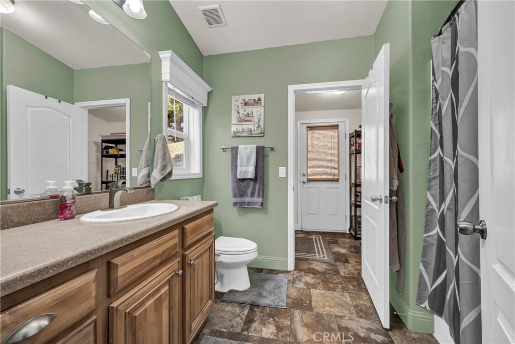 14986 Western Mine Road Middletown, CA 95461 - Photo 14 of 60 a spacious bathroom with a sink toilet and shower