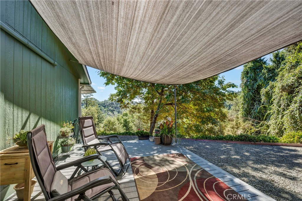 14986 Western Mine Road Middletown, CA 95461 - Photo 20 of 60 a view of yard from deck with patio