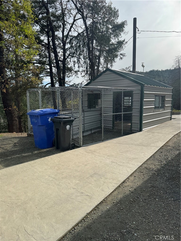 14986 Western Mine Road Middletown, CA 95461 - Photo 36 of 60 a front view of a house with a yard