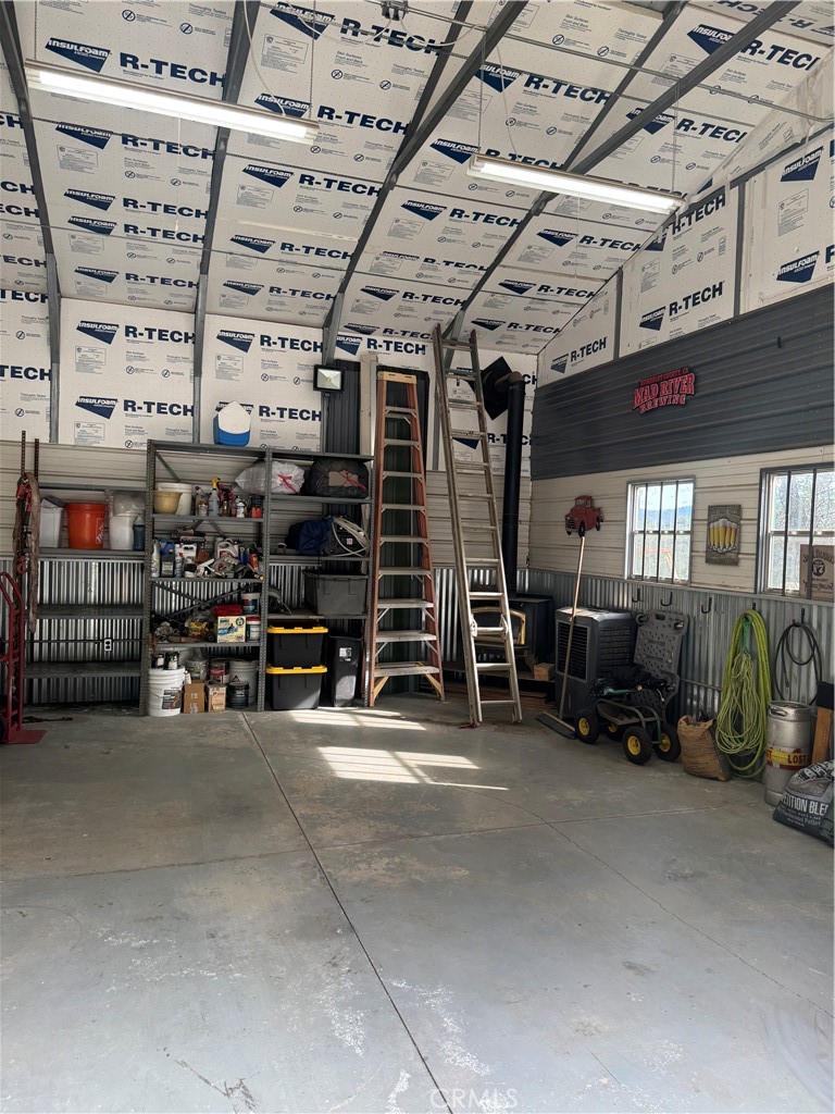 14986 Western Mine Road Middletown, CA 95461 - Photo 39 of 60 a view of a garage with storage