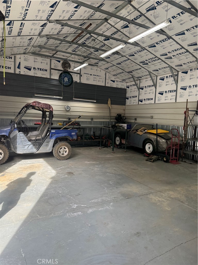 14986 Western Mine Road Middletown, CA 95461 - Photo 46 of 60 a view of parking garage with cars parked