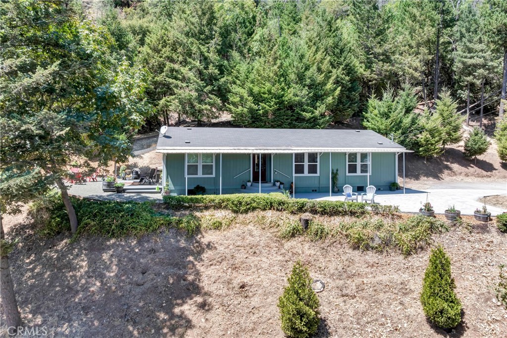 14986 Western Mine Road Middletown, CA 95461 - Photo 47 of 60 a front view of a house with a garden