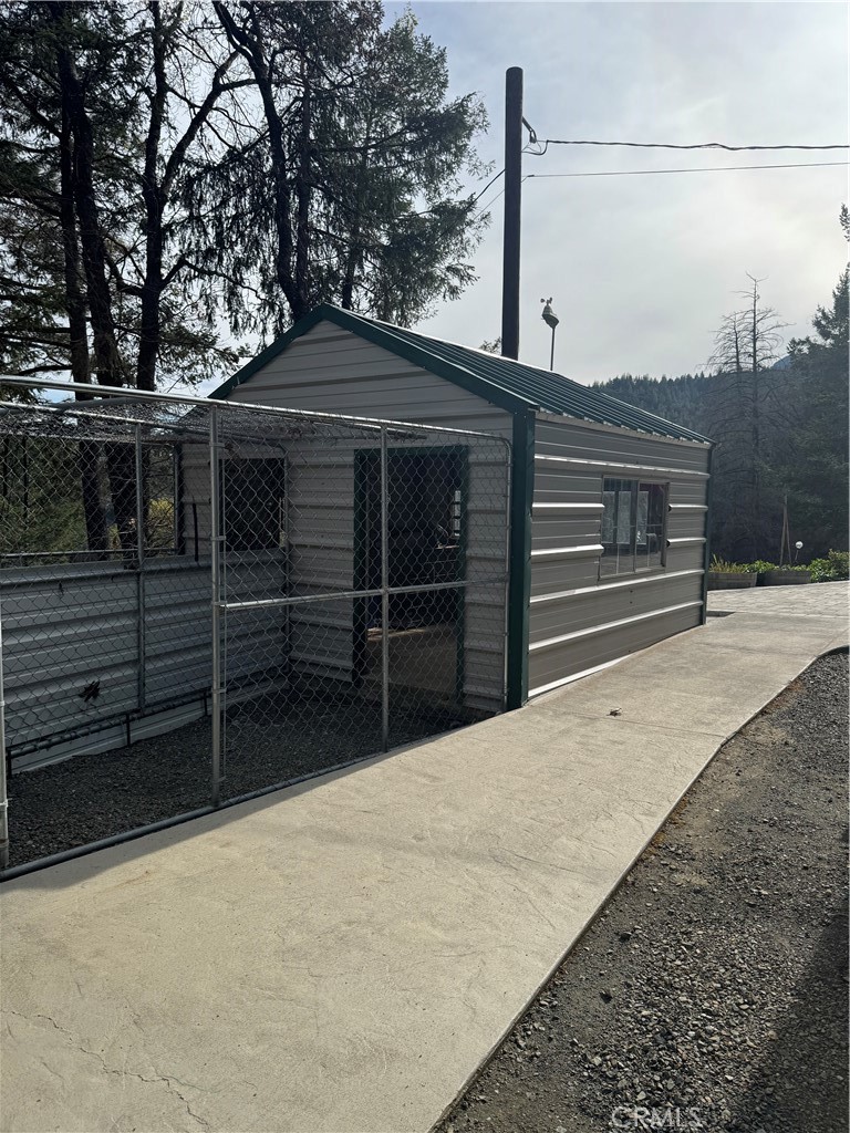 14986 Western Mine Road Middletown, CA 95461 - Photo 48 of 60 a view of a house with a garage