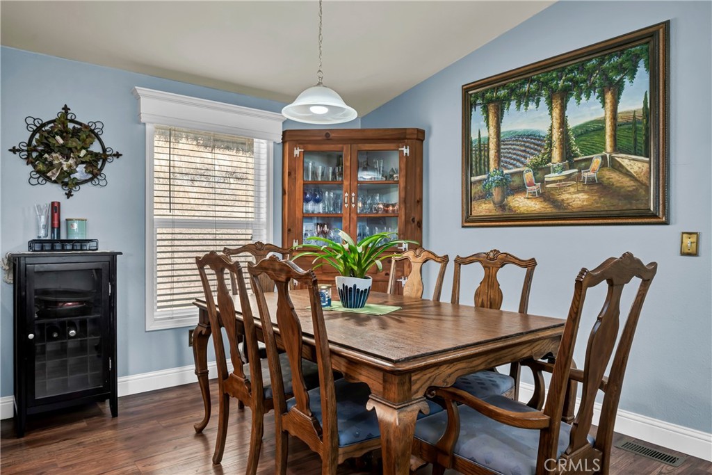 14986 Western Mine Road Middletown, CA 95461 - Photo 8 of 60 a view of a dining room with furniture window and wooden floor