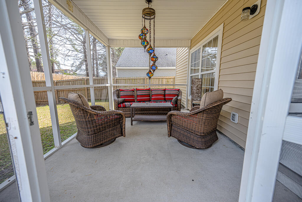 1100 Deerberry Road Hanahan, SC 29445 - Photo 32 of 44 Screened Rear Porch