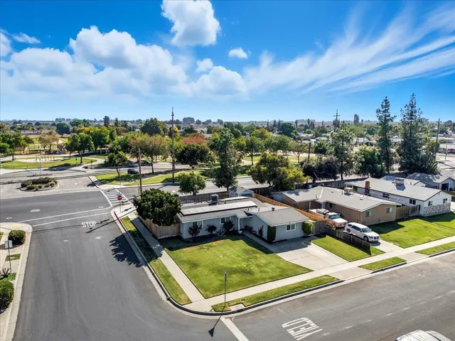 a view of a swimming pool with lounge chairs