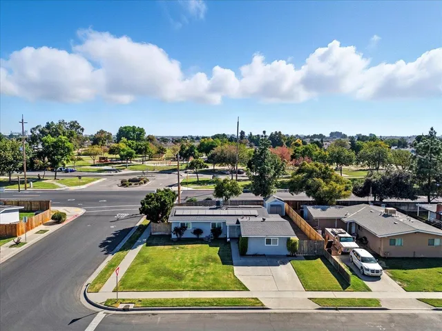 a view of a swimming pool and lounge chairs