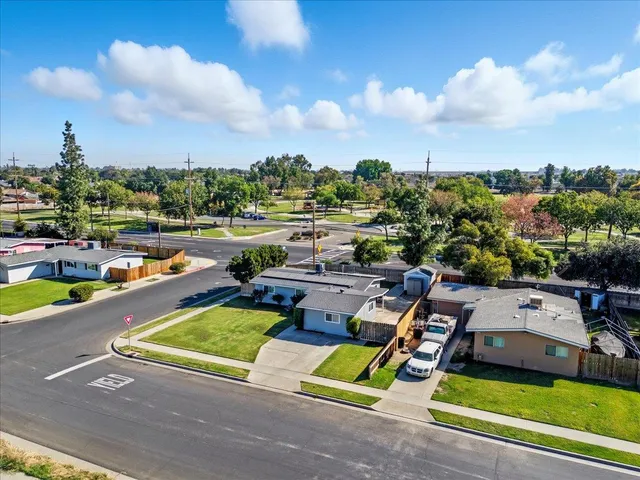 a view of a swimming pool with a lounge chairs