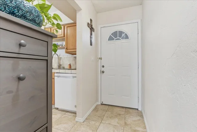 a view of a utility room with shower