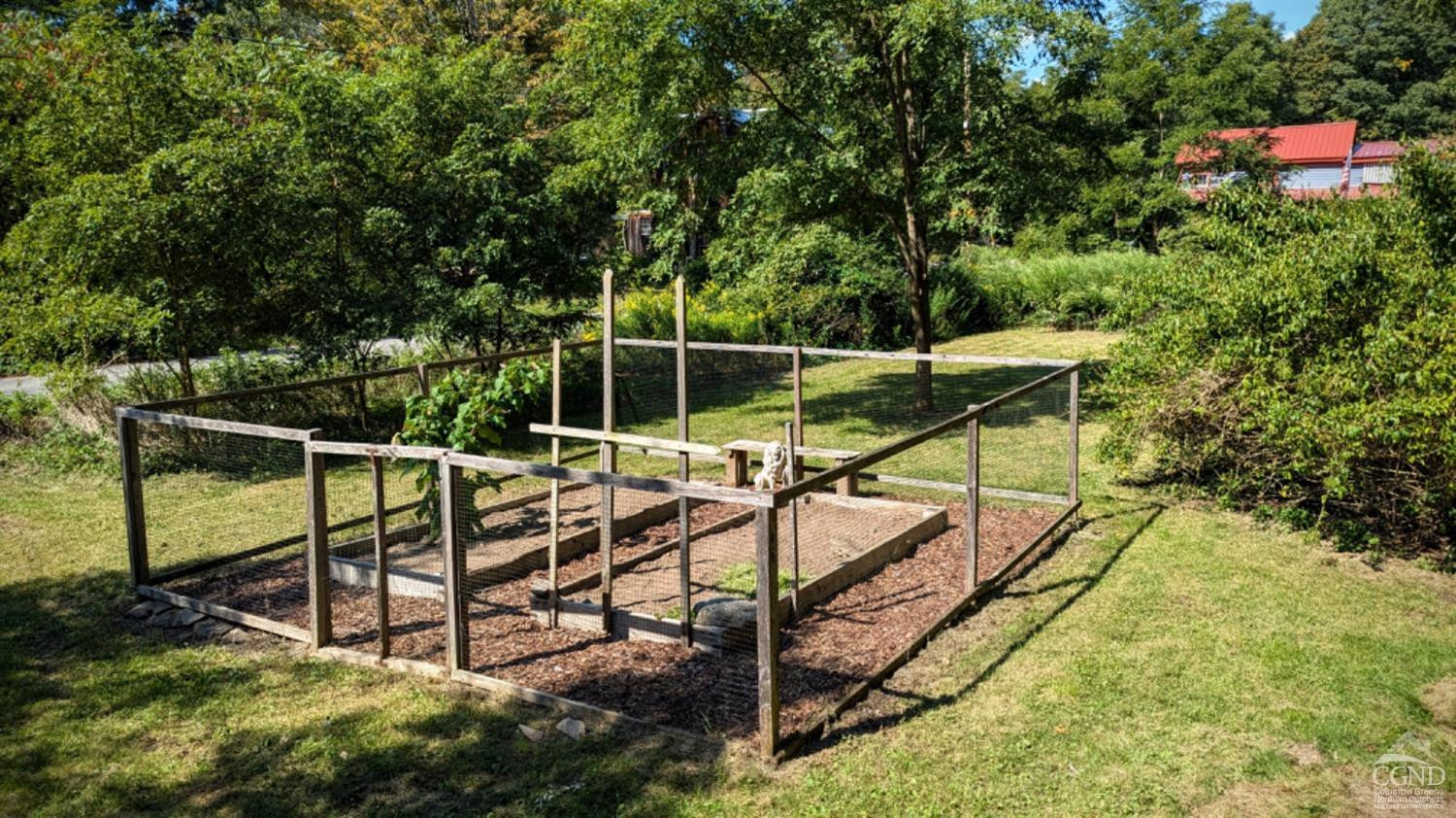 40 Guild Road Oak Hill, NY 12460 - Photo 33 of 38 The fenced garden in the lawn.