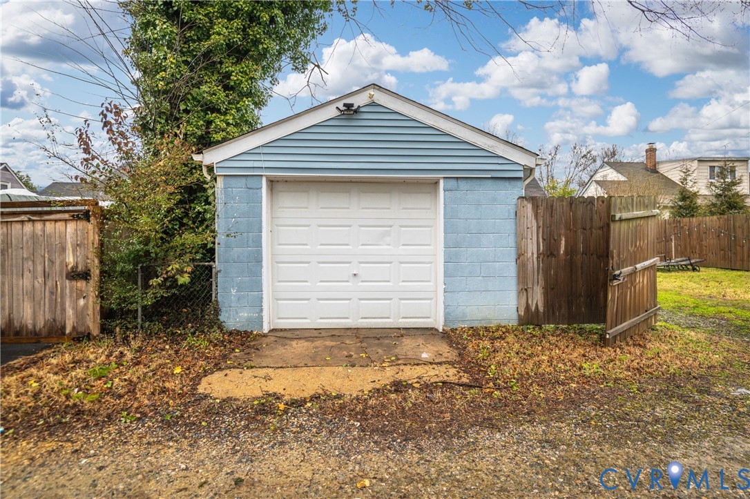 1311 Williamsburg Road Richmond, VA 23231 - Photo 35 of 38 Detached garage featuring light blue siding, a whi