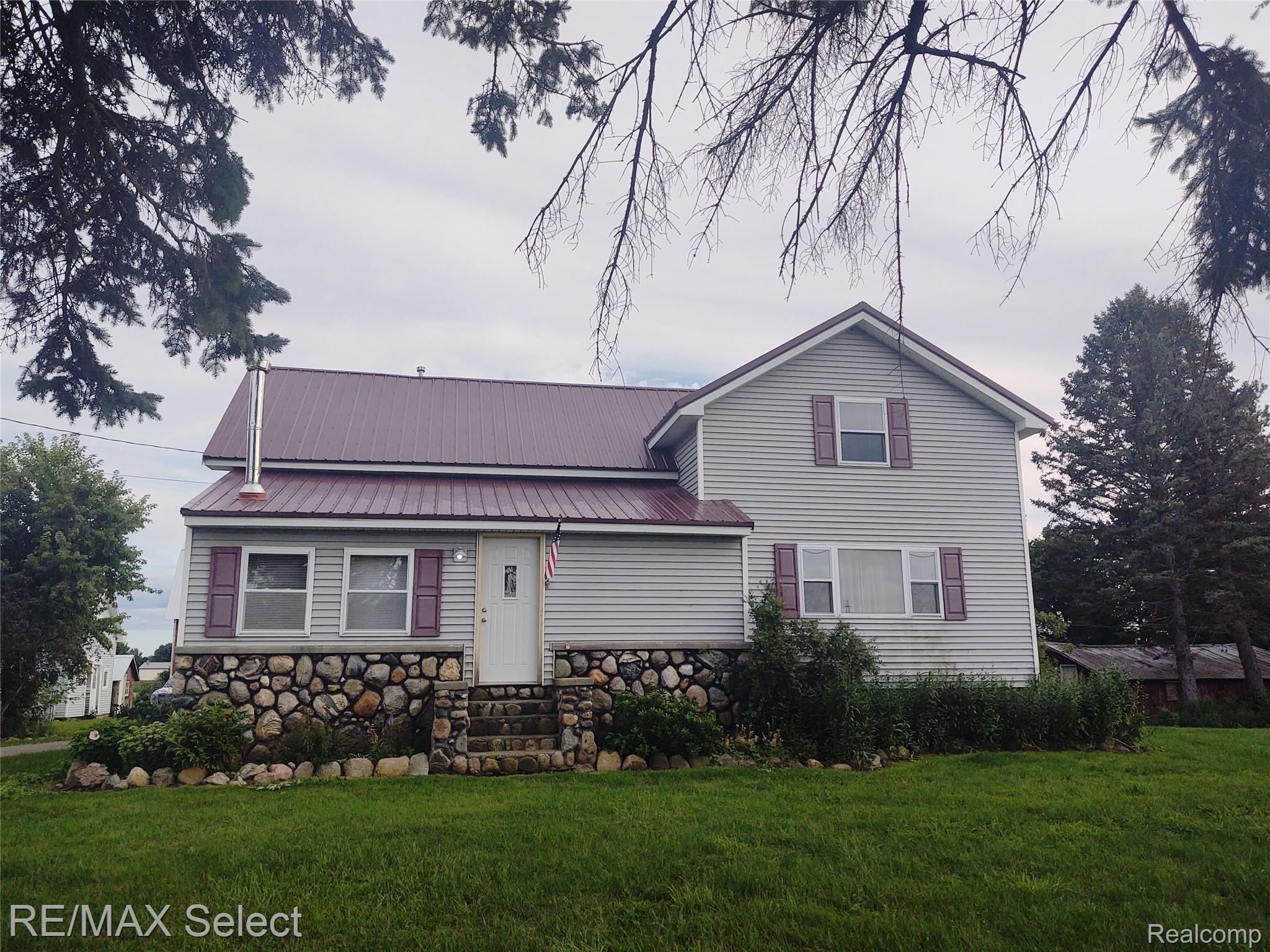 6087 Peet Road Chesaning, MI 48616 - Photo 1 of 55 front view.jpg
