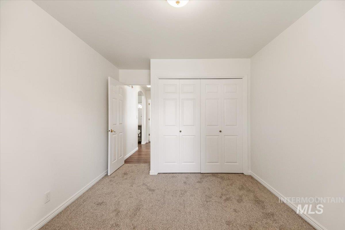 2032 Talus Loop Twin Falls, ID 83301 - Photo 25 of 43 Neutral-toned carpeting complements the light wall color