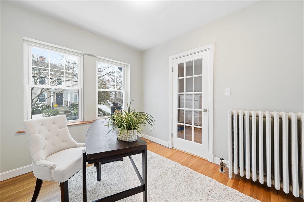 112 Ashcroft Road Medford, MA 02155 - Photo 26 of 42 a living room with furniture and a potted plant
