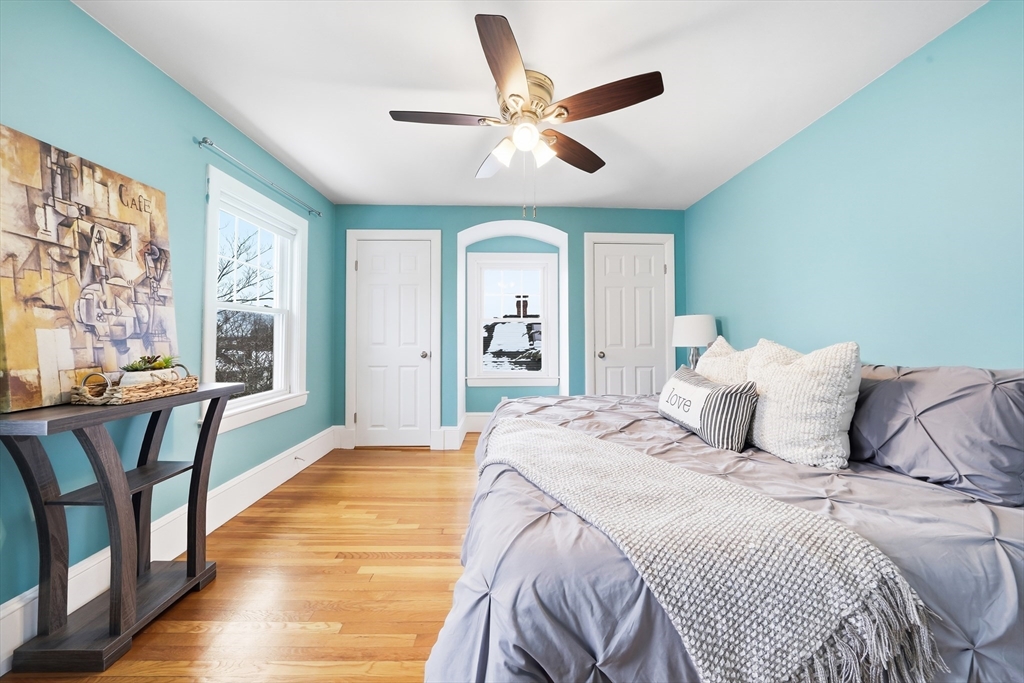 112 Ashcroft Road Medford, MA 02155 - Photo 31 of 42 a bedroom with a large bed and a large window