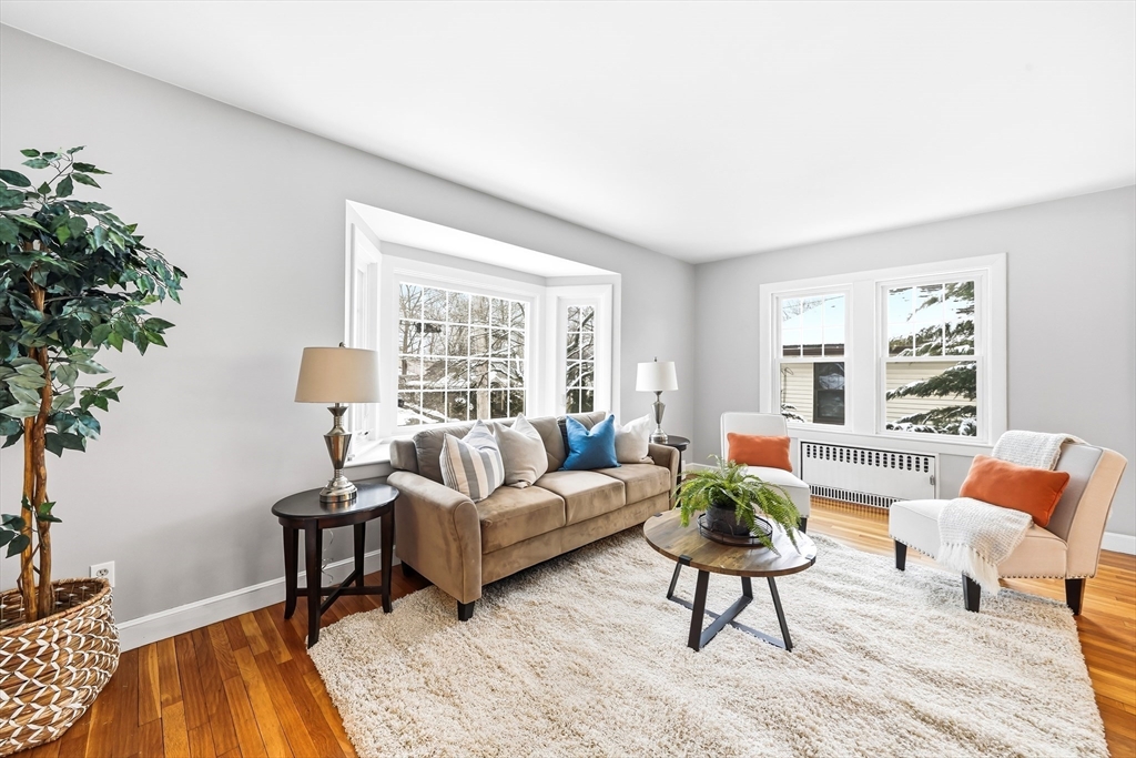 112 Ashcroft Road Medford, MA 02155 - Photo 5 of 42 a living room with furniture and a large window