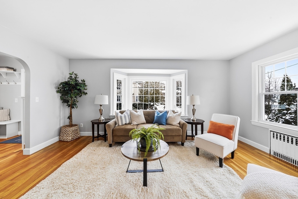 112 Ashcroft Road Medford, MA 02155 - Photo 7 of 42 a living room with furniture or couch and a potted plant