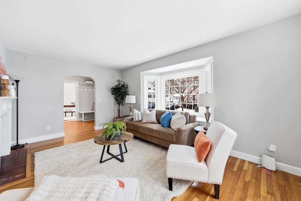 112 Ashcroft Road Medford, MA 02155 - Photo 8 of 42 a living room with furniture and a large window