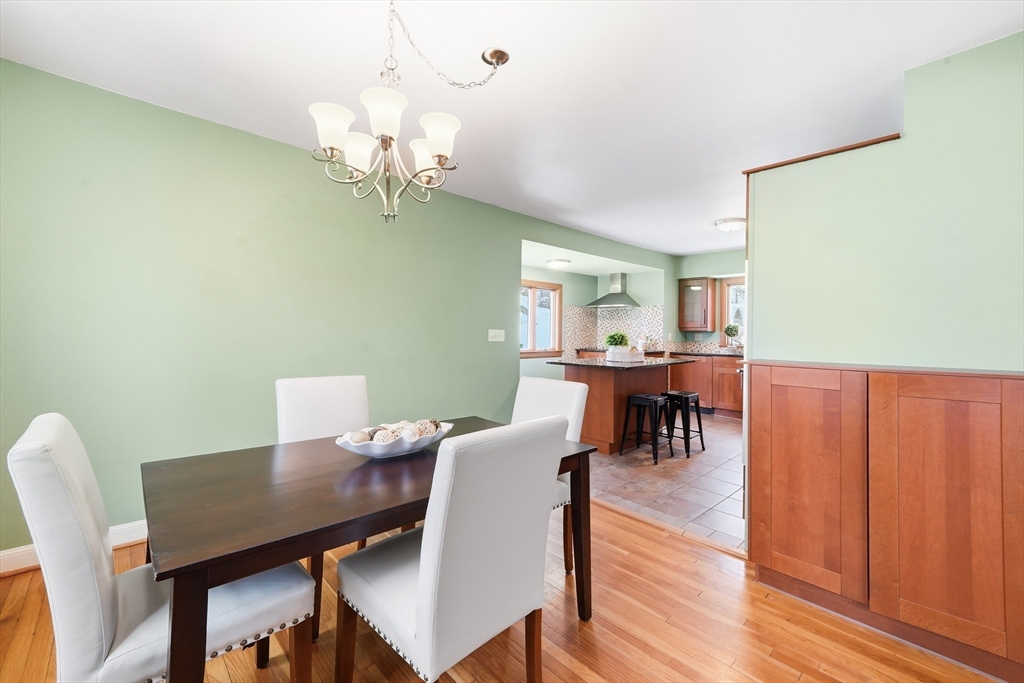 112 Ashcroft Road Medford, MA 02155 - Photo 10 of 42 a view of a dining room with furniture and wooden floor
