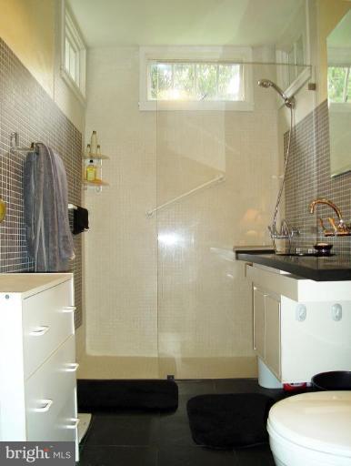 5700 Rusk Avenue Baltimore, MD 21215 - Photo 13 of 30 Renovated Bath w/walk in shower