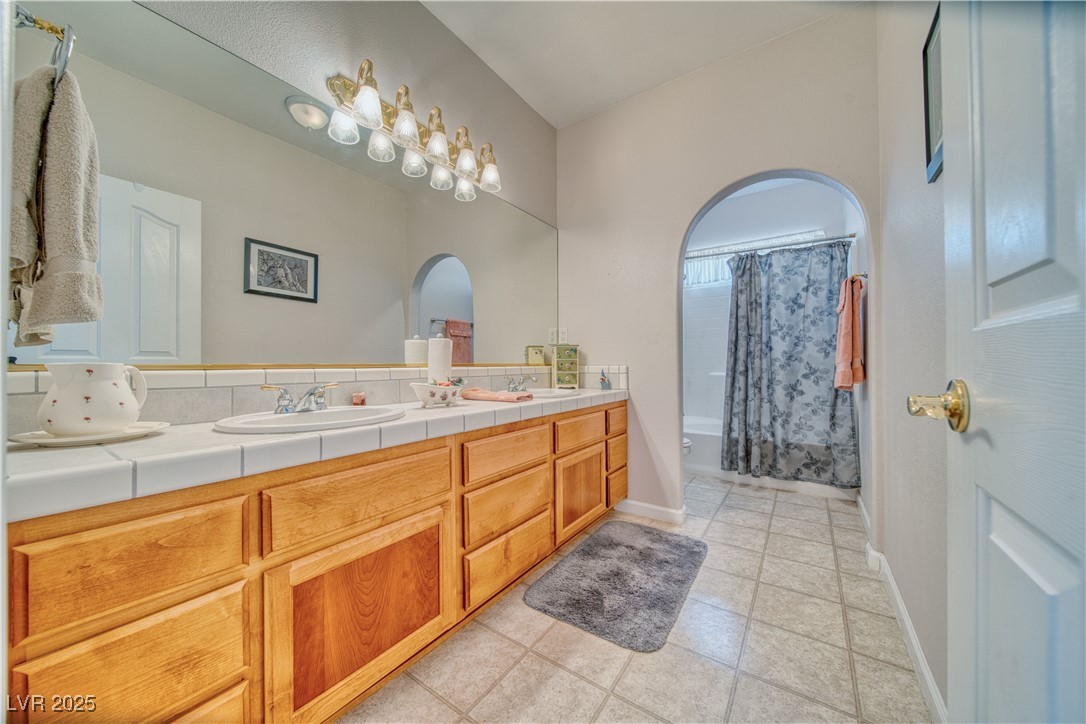 660 Indian Road Pahrump, NV 89048 - Photo 24 of 54 Bathroom 2. Bath/shower combo, 2 sink stations.
