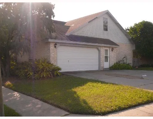 a living room with a fireplace and a flat screen tv