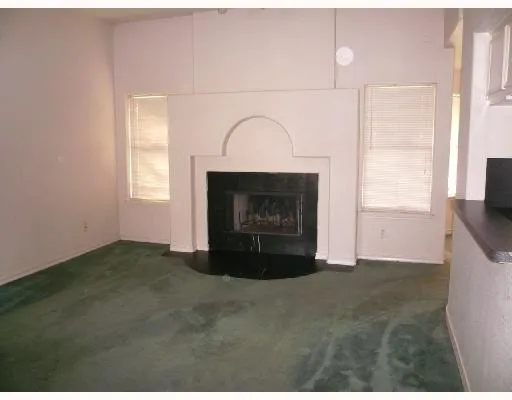 a kitchen with a sink a stove and refrigerator