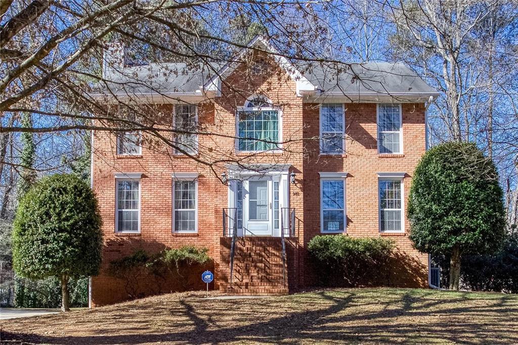 982 Trestle Drive Austell, GA 30106 - Photo 1 of 1 a front view of a house with a garden