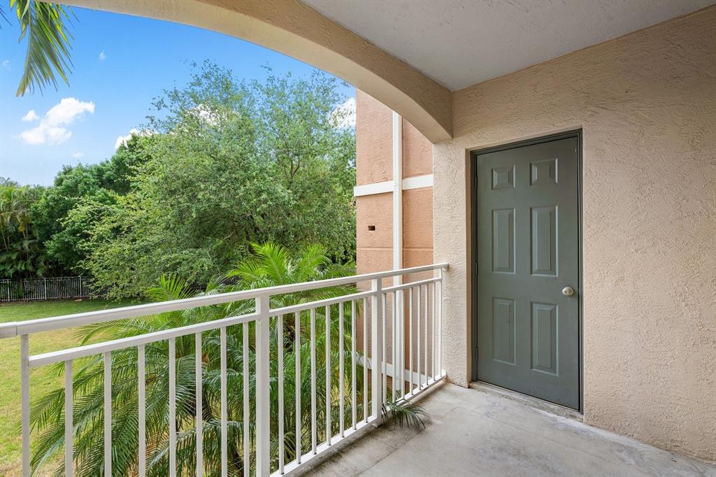 6492 Emerald Dunes Drive, Unit 208 West Palm Beach, FL 33411 - Photo 26 of 37 a view of a balcony