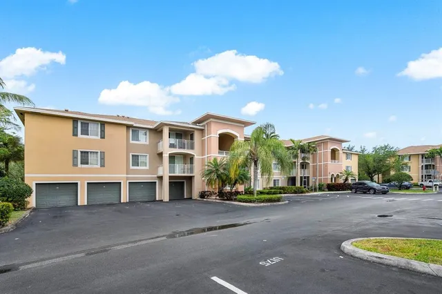 a kitchen with stainless steel appliances a refrigerator and a sink