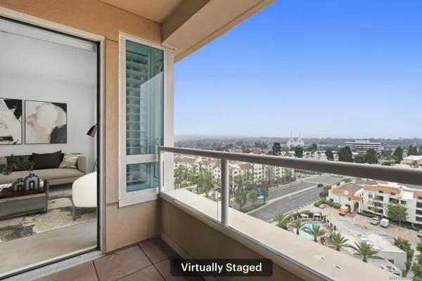 a bathroom with a granite countertop toilet and a sink